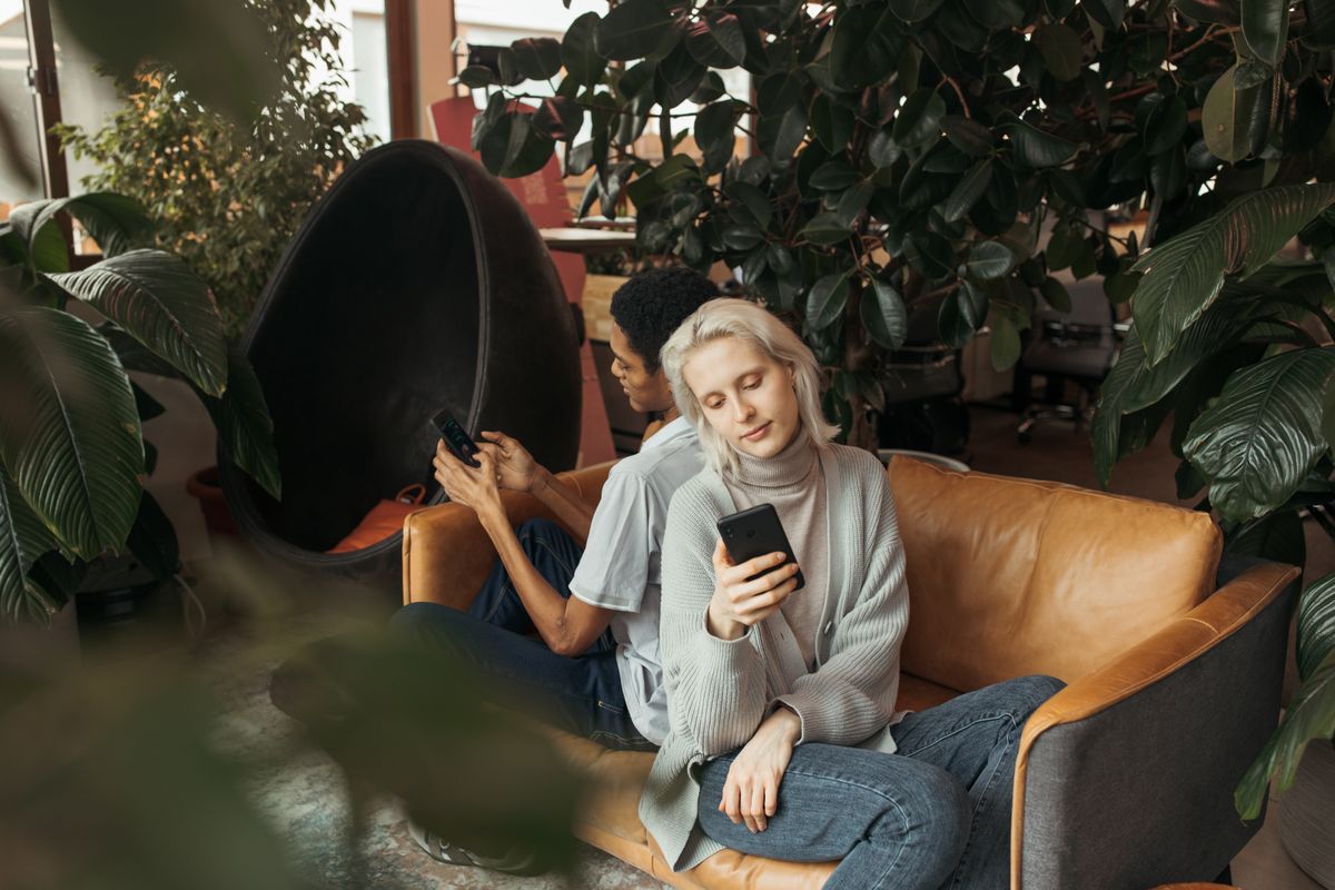 People using their devices at home